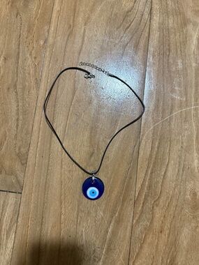 Evil Eye Pendant Necklace - Blue Glass Charm on Black Cord
